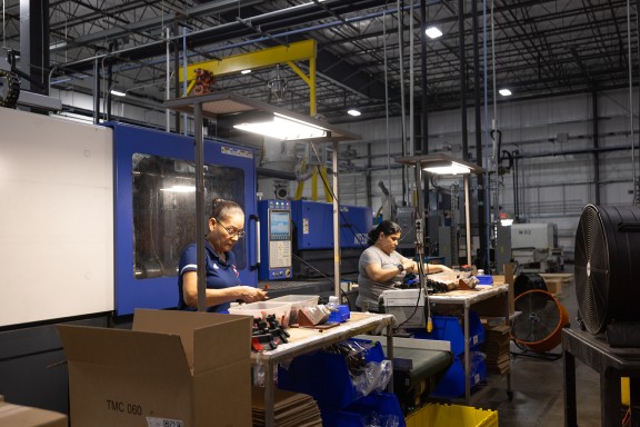 people working in warehouse